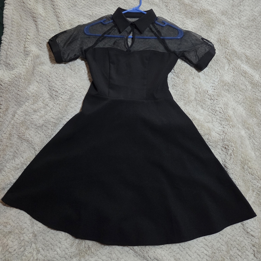 Elegant Black Dress with Sheer Details